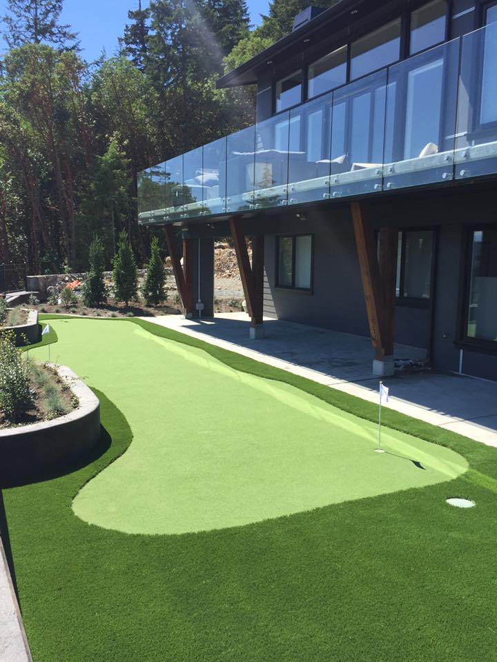 Artificial grass putting green installation