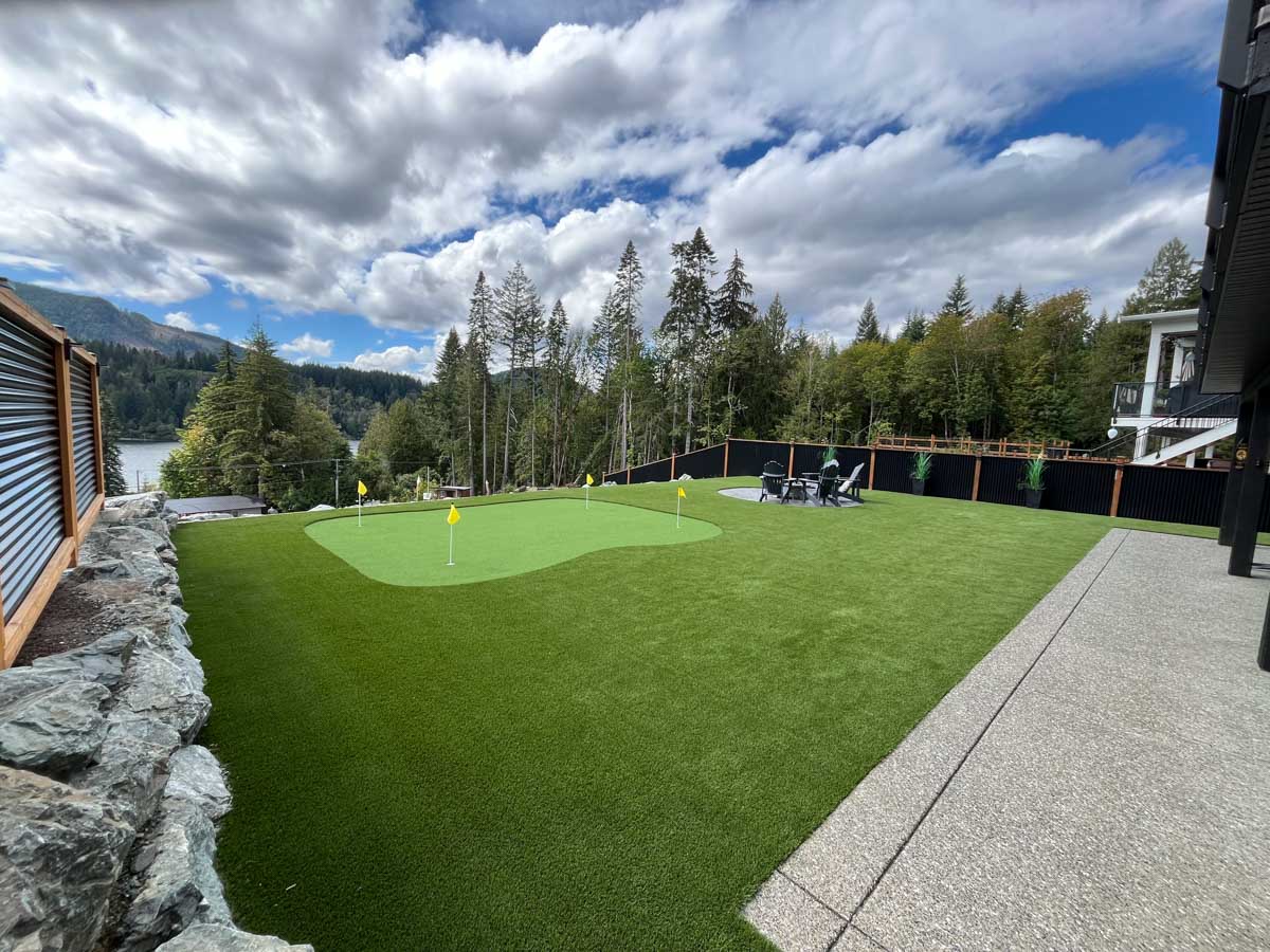 Lush green lawn with putting green.